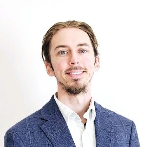 Portrait of Daniel Smith, Managing Director of Site Origination at Powered Land Solutions